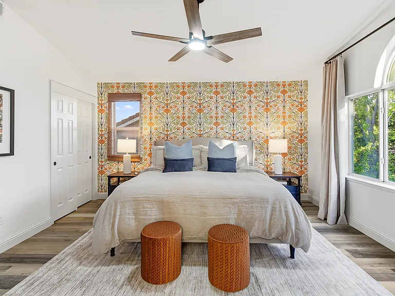 Sleep in luxury with soft linens and a beautifully designed bedroom