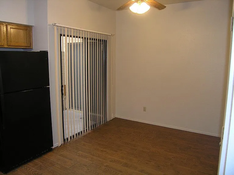 Eat-in kitchen with arcadia doors to patio