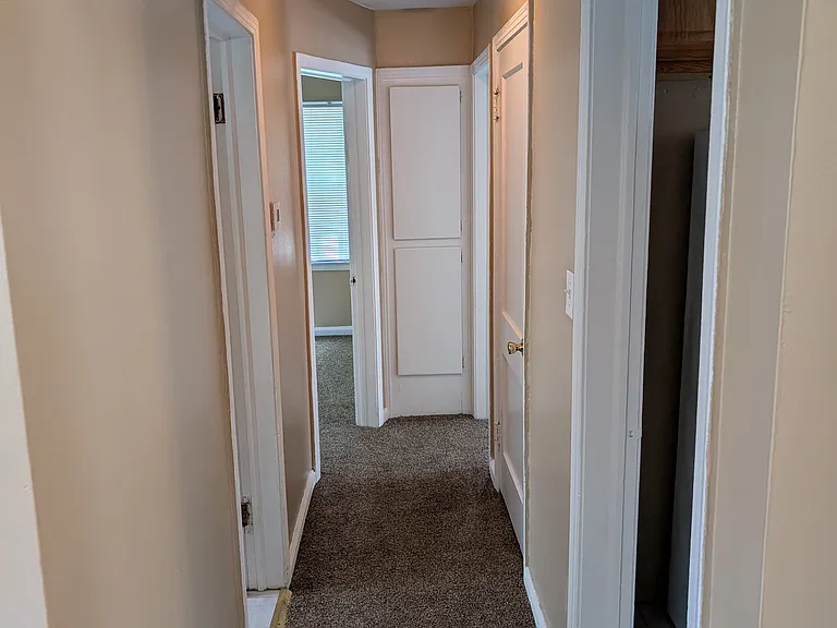 Hall to Kit, bath, bed rms