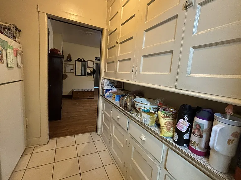 Butler's pantry adds much cabinetry for the chef of the house