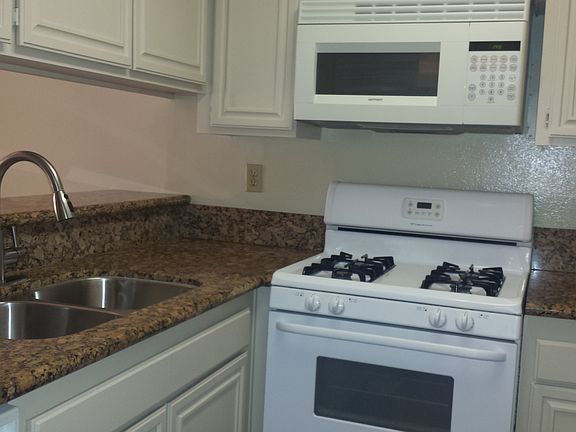 Kitchen with Granite counters.