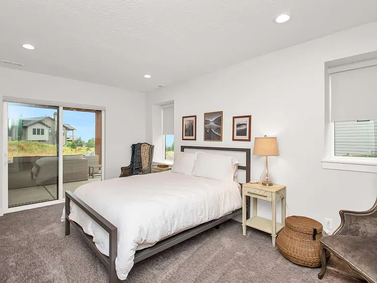 Bedroom with closet, queen bed and french doors to outside patio with hot tub and gas fire pit.
Full Bathroom shared with adjacent room.