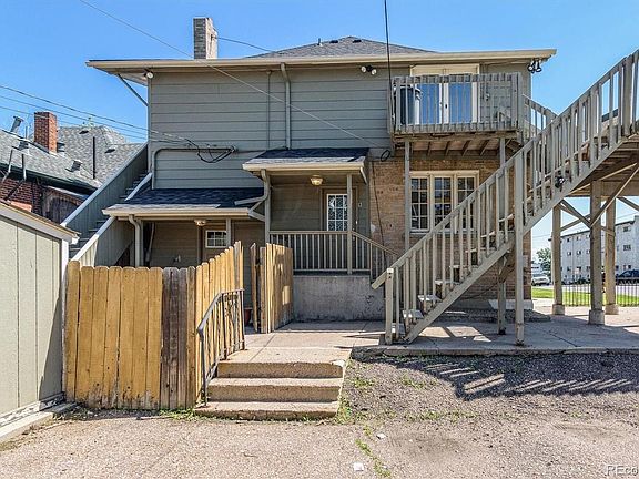 Back of the house and access to the basement unit