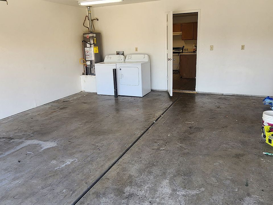 Two car garage with laundry with entrance to kitchen. Very convenient!