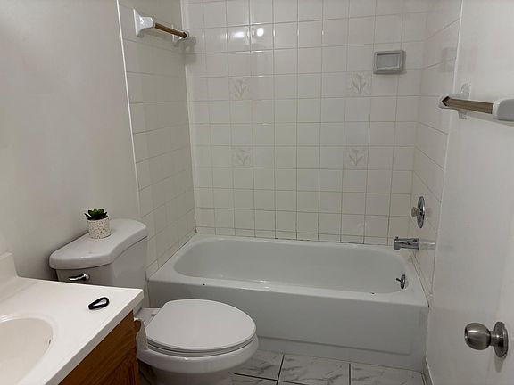 Second bathroom with shower/bathtub