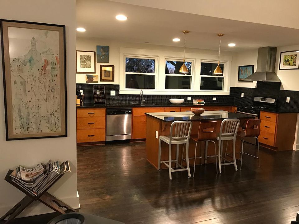 Lots of light, cabinets, and granite counter tops
