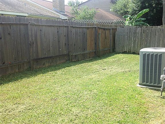 fully fenced back yard