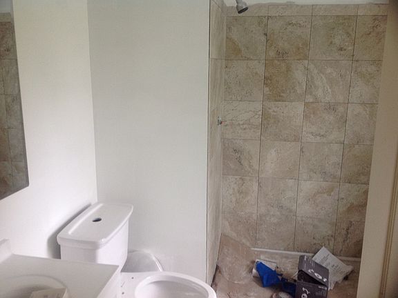 Tiled shower and New Fixture