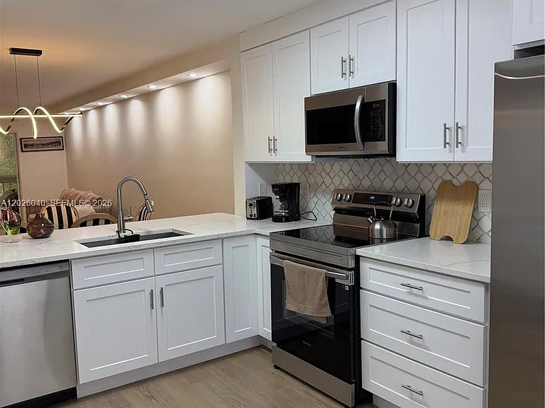 7350 Kinghurst Dr #305 — Photo 21
