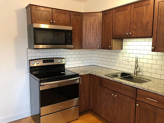 Oak cabinets with ample storage.