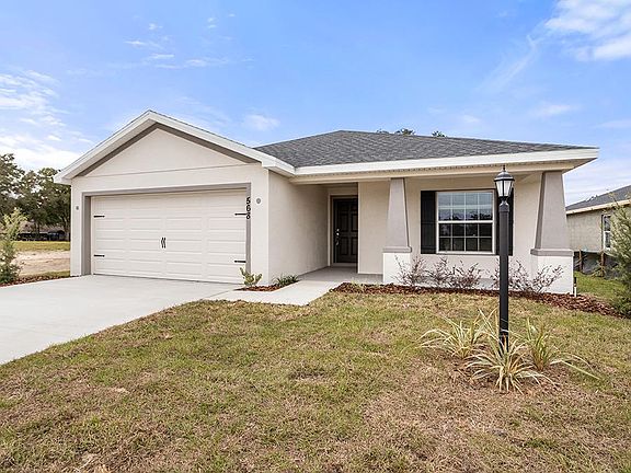 Welcome home to 568 SW 77th Circle in Ocala