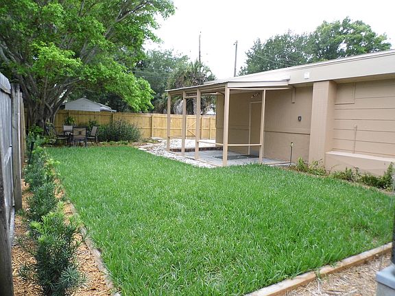 fenced landscaped yard