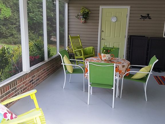 Screened-in carport