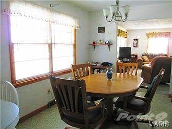 View of dining room and living room from kitchen.