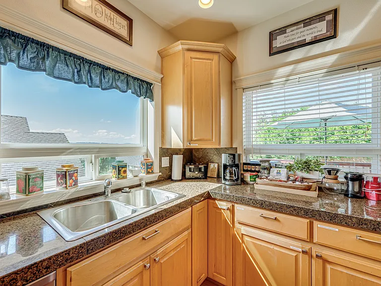 Enjoy views of the Columbia River as you do the dishes or cook