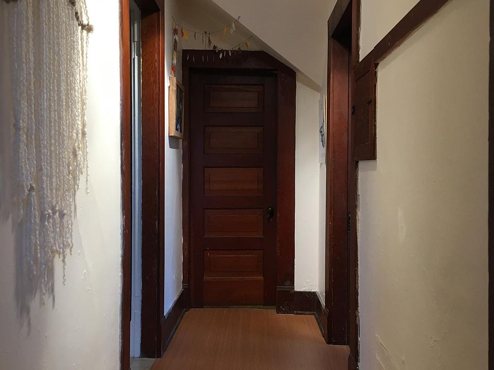Hallway upstairs, kitchen to left, bathroom straight ahead and bedroom 2 to right
