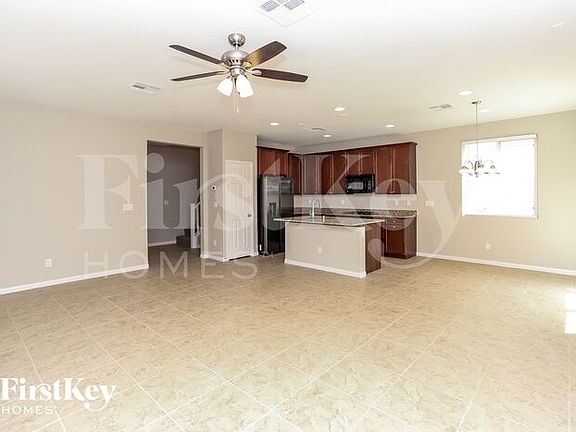 4th image of 6943 Yellow Cosmos Ave