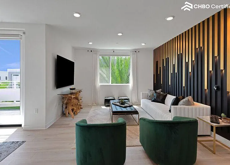 Spacious Great Room with 77" Sony OLED & LED Slatted Wall