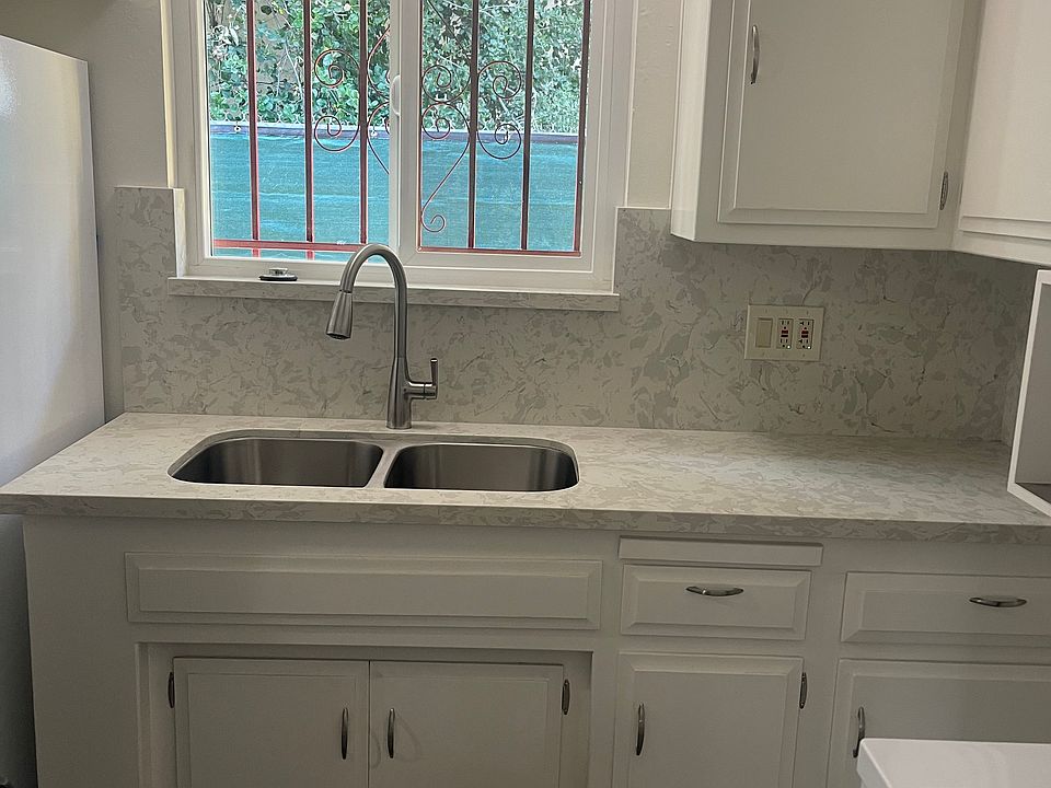Newly updated kitchen with stone counters