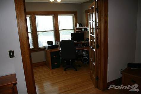 open french doors to sunroom/den/office