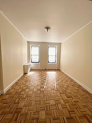1st image of 457 W 49th St APT 2E