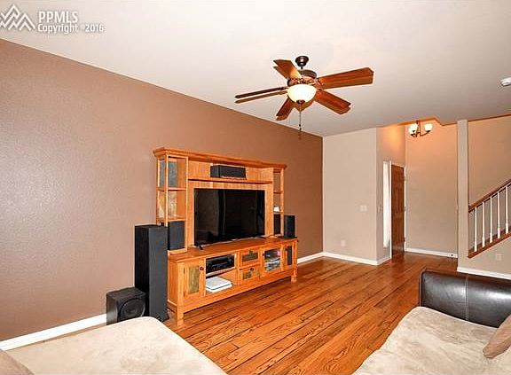 Living room open to entry and dining