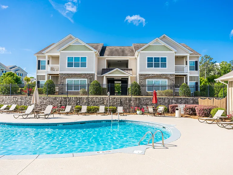 Sparkling swimming pool with sundeck