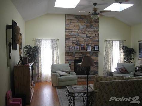 Living Room with Stone Fire Place