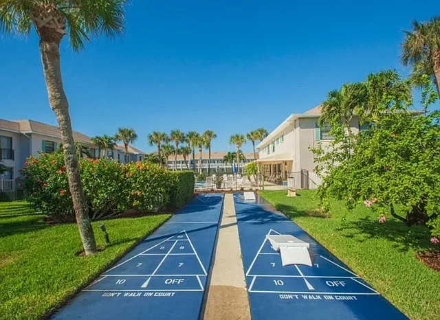 Shuffleboard and cornhole playing area.