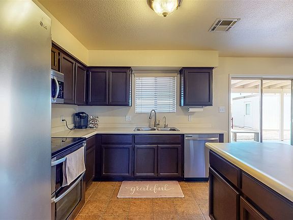 5th image of 8562 E 39th Pl
