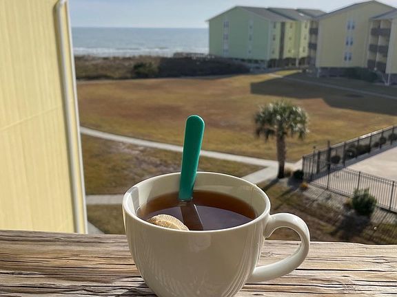 Relax on the private deck watching the waves