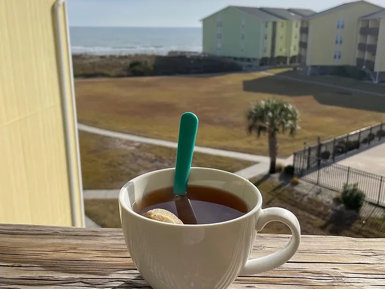 Relax on the private deck watching the waves