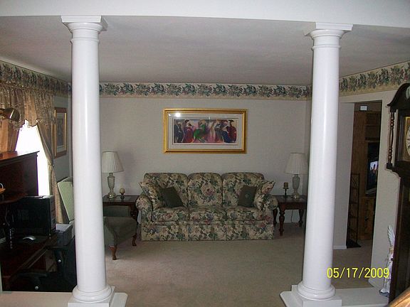 Columned entrance to living room