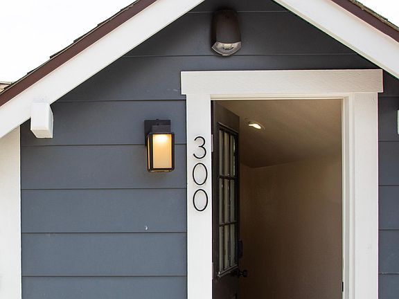 1351 Terrace Unit 300 features access via an incredible spiral stair which lands on 500 square feet of private raised deck with a northward filtered view of the student union building.