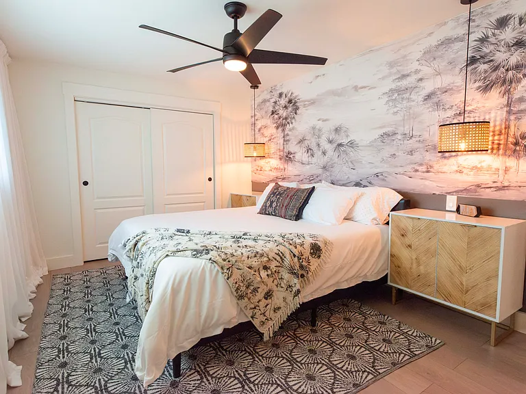 Third bedroom faces the pool and has a King sized bed and a television.