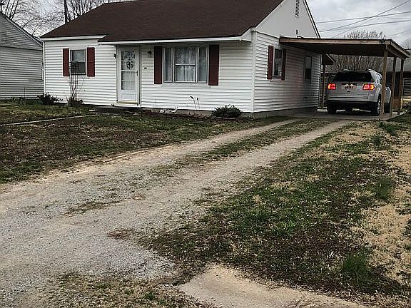 Front/ carport and driveway