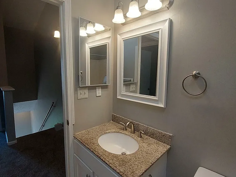 Spacious Full Bath + Modern Cabinets, Modern Lighting, Granite Counter Tops