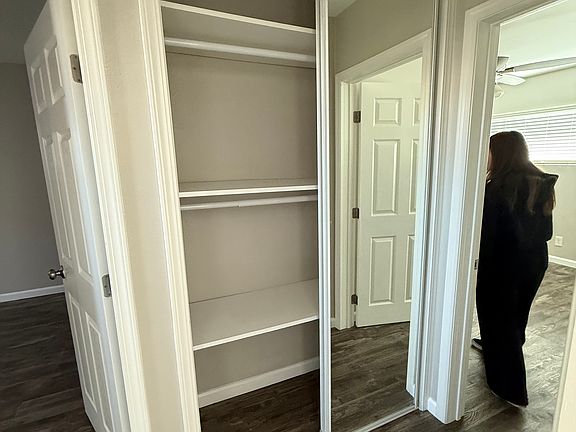Hallway with spacious cabinets for linens or just storage