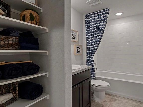 Bathroom with extra shelf for storage space