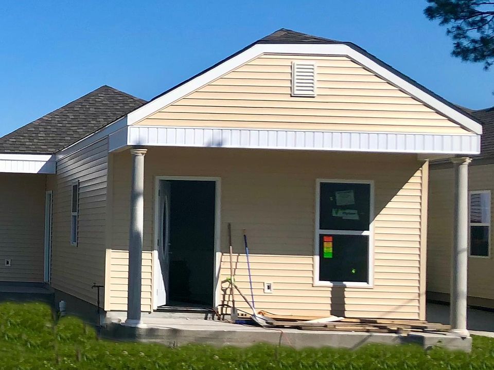 Front porch leads to living room.