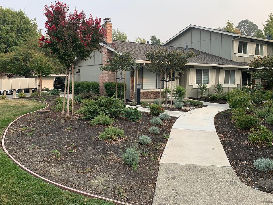 Single story end unit with new landscaping and exterior paint