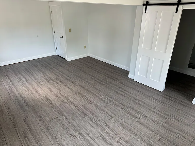 View of master bedroom from the window side.