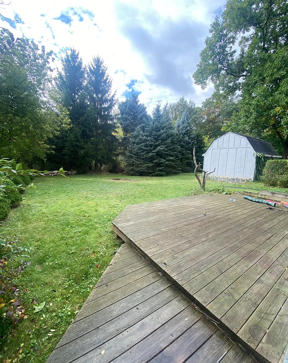 Large backyard with no neighbors behind. Perfect for a well behaved dog. The back deck is currently being repaired. - 1208 Windermere Dr
