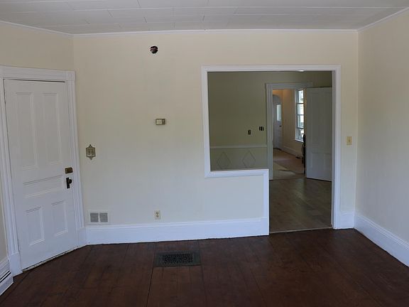 Living room, looking into the dining room.