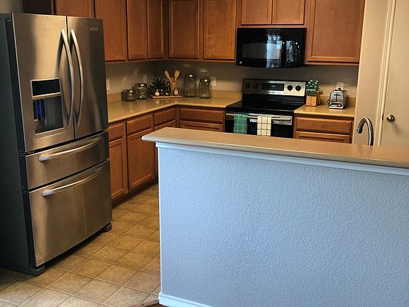4th image of 7509 Howling Coyote Ln