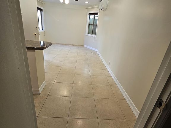 Open unit with split system AC and ceiling fan