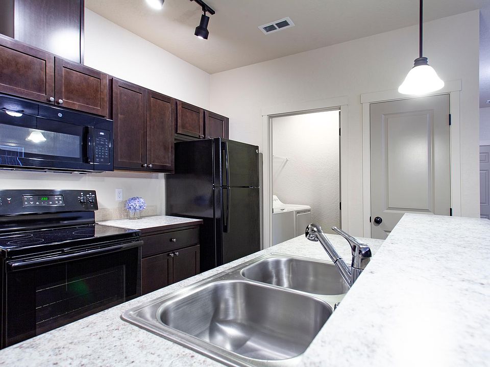 Upgraded apartment homes feature glass cook tops, microwaves, disposal, dishwasher, full size washer/dryer, in-freezer ice maker, sink sprayer, CENTRAL AC, so much more.