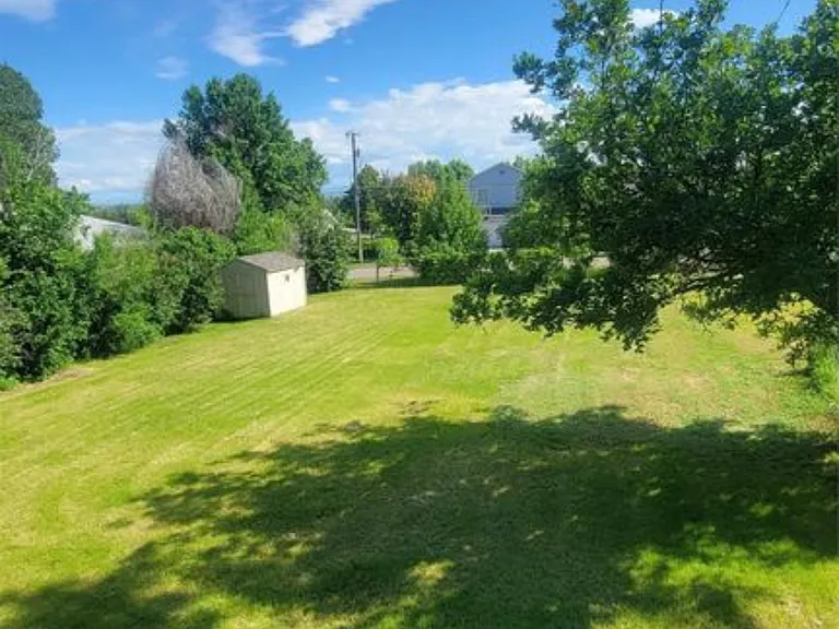 Overlooking backyard from rear deck patio