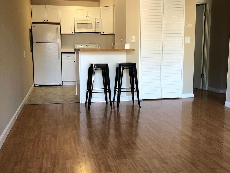 This unit is a second floor unit that has received a glow-up. New features include a breakfast bar, microwave, dishwasher and in-unit laundry