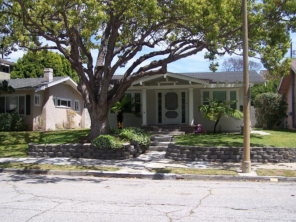 1226 Portola front house. Units A & B in the back. Parking on Portola or parking in back garage.